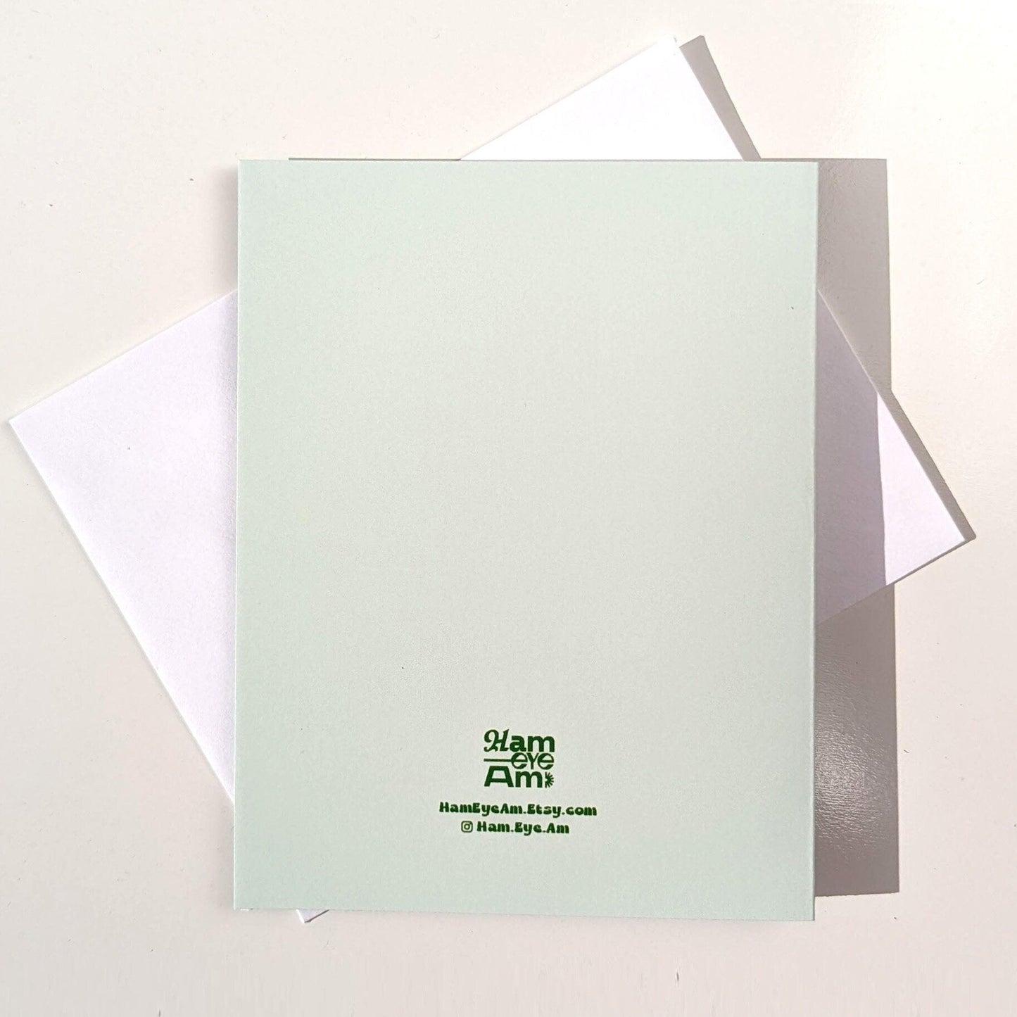 Light green card with black text on a white background