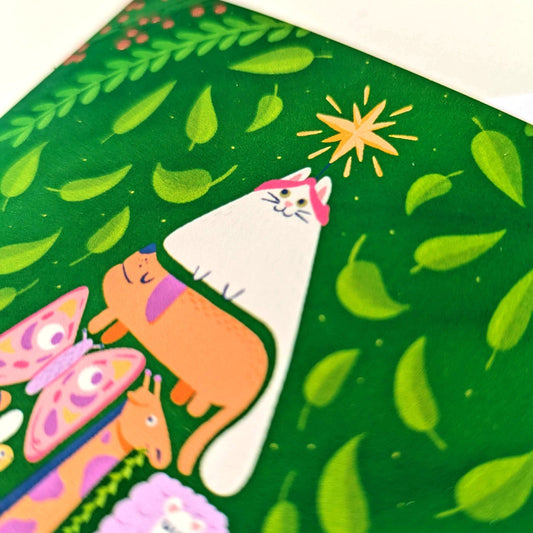 Colorful children's book with animal illustrations on a green background